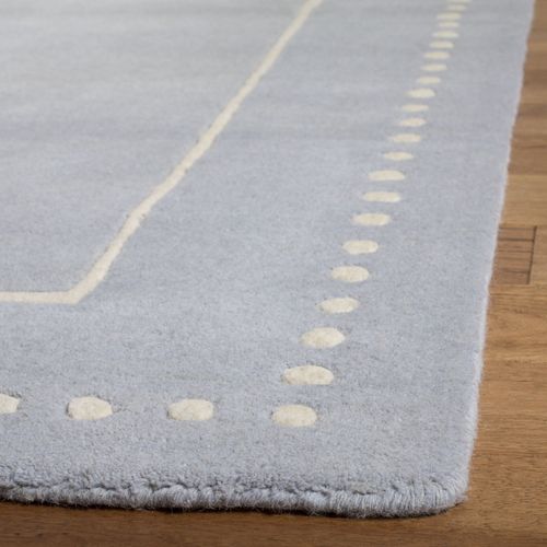 Tapis Bella 61 X 91 Cm Bordure En Pointilles Galilea Bleu Clair / Ivoire
