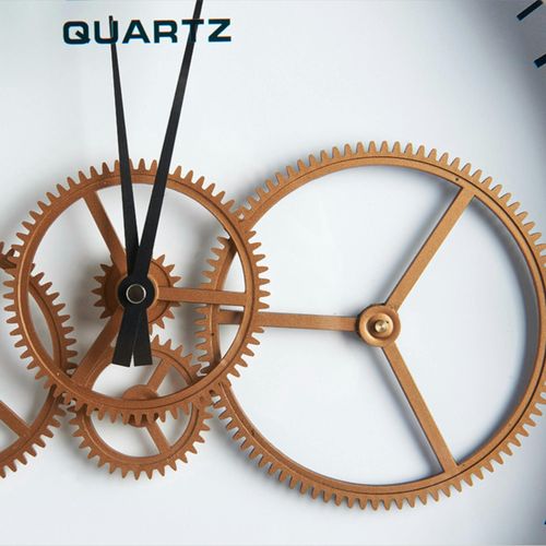 Horloge Engrenages Or Fond Blanc