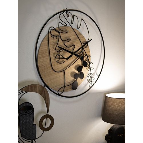 Horloge Murale Ronde 60 Cm En Métal Et Bois Avec Lignes Sinueuses Représentant Visage Et Feuilles